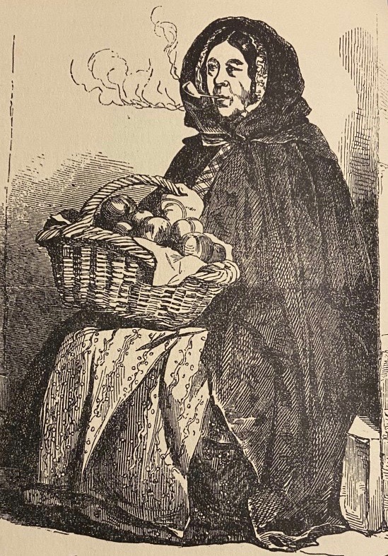 Drawing of a woman wearing a long cloak with the hood up. She is smoking a pipe and holds a basket of apples for sale.